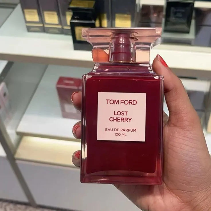 Tom Ford - Lost Cherry EDP - MANZARA STORE - Perfume Available at MANZARA STORE - Tom Ford - Men, Tom Ford, Unisex, Woman- Product Title Tom Ford - Lost Cherry Eau De Parfum (EDP) Product Description Indulge in the provocative sweetness of Tom Ford Lost Cherry EDP, a daring and addictive fragrance that redefines sensuality. With its luscious blend of ripe cherries, warm almonds, and creamy tonka beans, this perfume offers a unique combination of playful charm and deep sophistication. Key Notes Top Notes: Bl