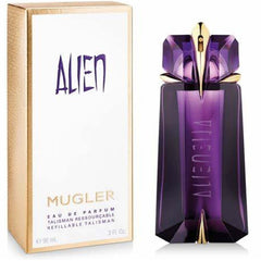 Alien Mugler - MANZARA STORE - Perfume Available at MANZARA STORE - Alien Mugler - Alien Mugler, All Products, Woman- Alien Eau De Parfum by Mugler Product Description: Step into a world of mystery and allure with Alien Eau De Parfum by Mugler. This enchanting fragrance is designed for the woman who radiates confidence and power. With its captivating blend of floral, woody, and amber notes, Alien is a bold and unforgettable scent that transcends time and space, creating an aura of elegance and mystery where