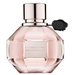 Flowerbomb Viktor&Rolf for women - MANZARA STORE - Perfume Available at MANZARA STORE - VICTOR&ROLF - All Products, Victor&ROLF, Woman- Flowerbomb Eau De Parfum by Viktor&Rolf Product Description: Flowerbomb Eau De Parfum by Viktor&Rolf is an explosion of floral elegance and sophistication. This luxurious fragrance combines an enchanting bouquet of floral notes with warm, sensual undertones, creating a captivating and long-lasting scent. Designed for the modern, confident woman, Flowerbomb is perfect for ev