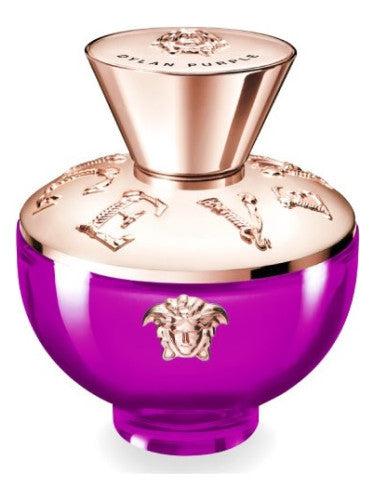 Versace Pour Femme Dylan Purple Versace - MANZARA STORE - Perfume Available at MANZARA STORE - Versace - All Products, Versace, Woman- Versace Pour Femme Dylan Purple Eau de Parfum by Versace Product Description: Versace Pour Femme Dylan Purple is a vibrant and elegant fragrance that celebrates modern femininity with a touch of Mediterranean charm. This radiant scent opens with sparkling notes of Italian bergamot and juicy pear, leading to a heart of delicate freesia and purple flowers. The base is a warm b